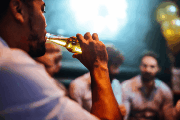 guy drinking a beer