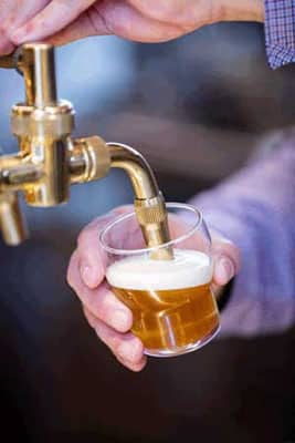 small glass beer tap served by Ohio bartender