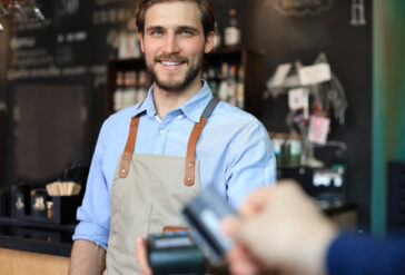 Professional bartender preparing a cocktail after completing an alcohol certification course.