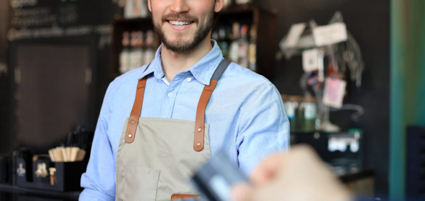 Professional bartender preparing a cocktail after completing an alcohol certification course.